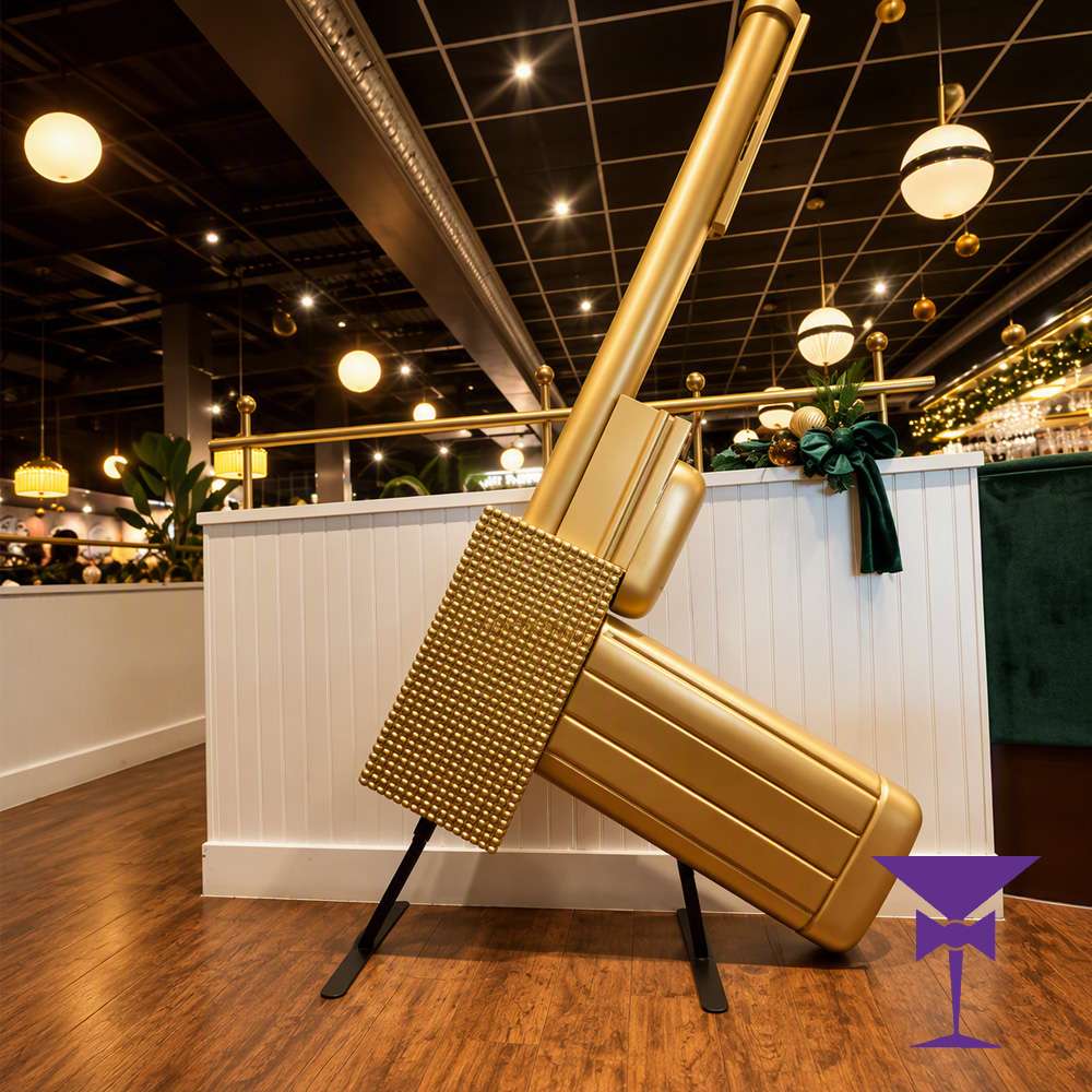 Giant Golden Gun Prop for hire