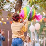 Children,Celebrating,Birthday,In,Park.,Group,Of,Children,Smash,Pinata