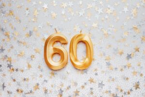 Number,60,Sixty,Golden,Celebration,Birthday,Candle,On,Festive,Background.