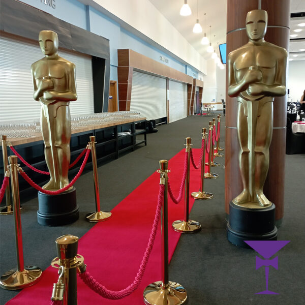 Giant Oscars Statues Pictured with a red carpet