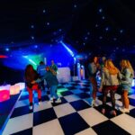 UV retro themed party in a marquee