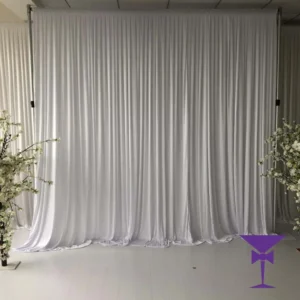 White Wall Draping Hire - White wall draping hire London, Surrey, Kent & Sussex. We offer pleated luxury drapes for all occasions