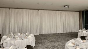 Our white wall drape hire is available in 3 metre widths. White Pleated Drape in London, Kent, Surrey & Sussex