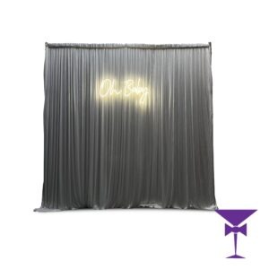 Oh-Baby-Neon-With-Drape - Oh Baby LED Neon With Drape Backdrop for hire.