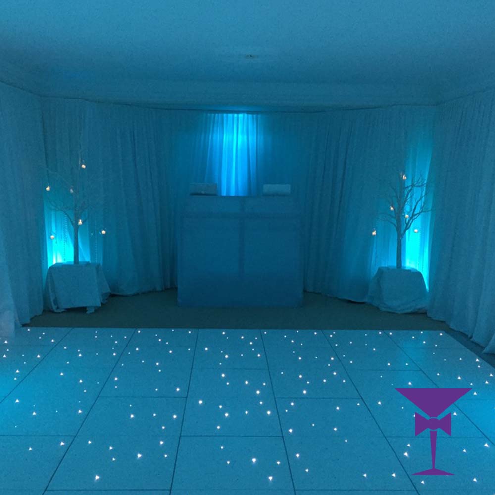 White Draping With Uplighting & Dance Floor - White Wall Draping, LED Uplighters and LED dance floor