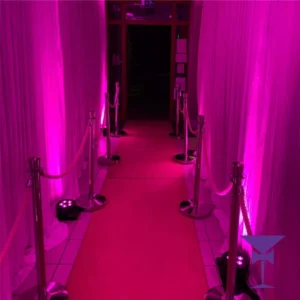 White-Drape-Hire-With-Uplighting - A recent corridor drape with uplighting in pink. Uplighting a corridor quickly transforms an entrance into your function room