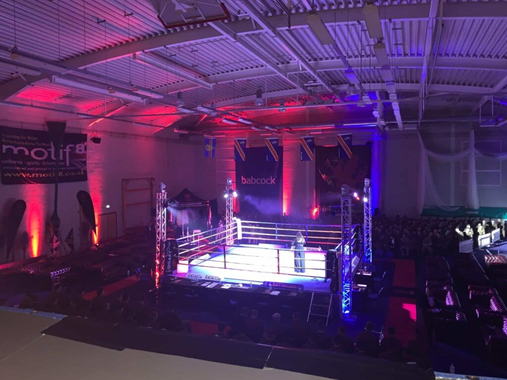 Referee in ring - boxing event production