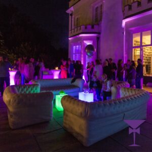 White-Chesterfield-Inflatable-Sofa-Hire-At-Night