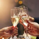 Hands,,Group,And,Toast,Champagne,At,Party,In,Celebration,,Goals