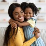 Mother,Daughter,Love.,Happy,Black,Woman,Hugging,With,Her,Child